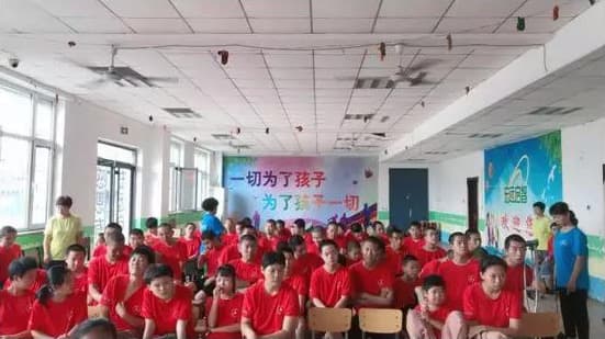 Summer camp children visit a Tangshan rehabilitation centre