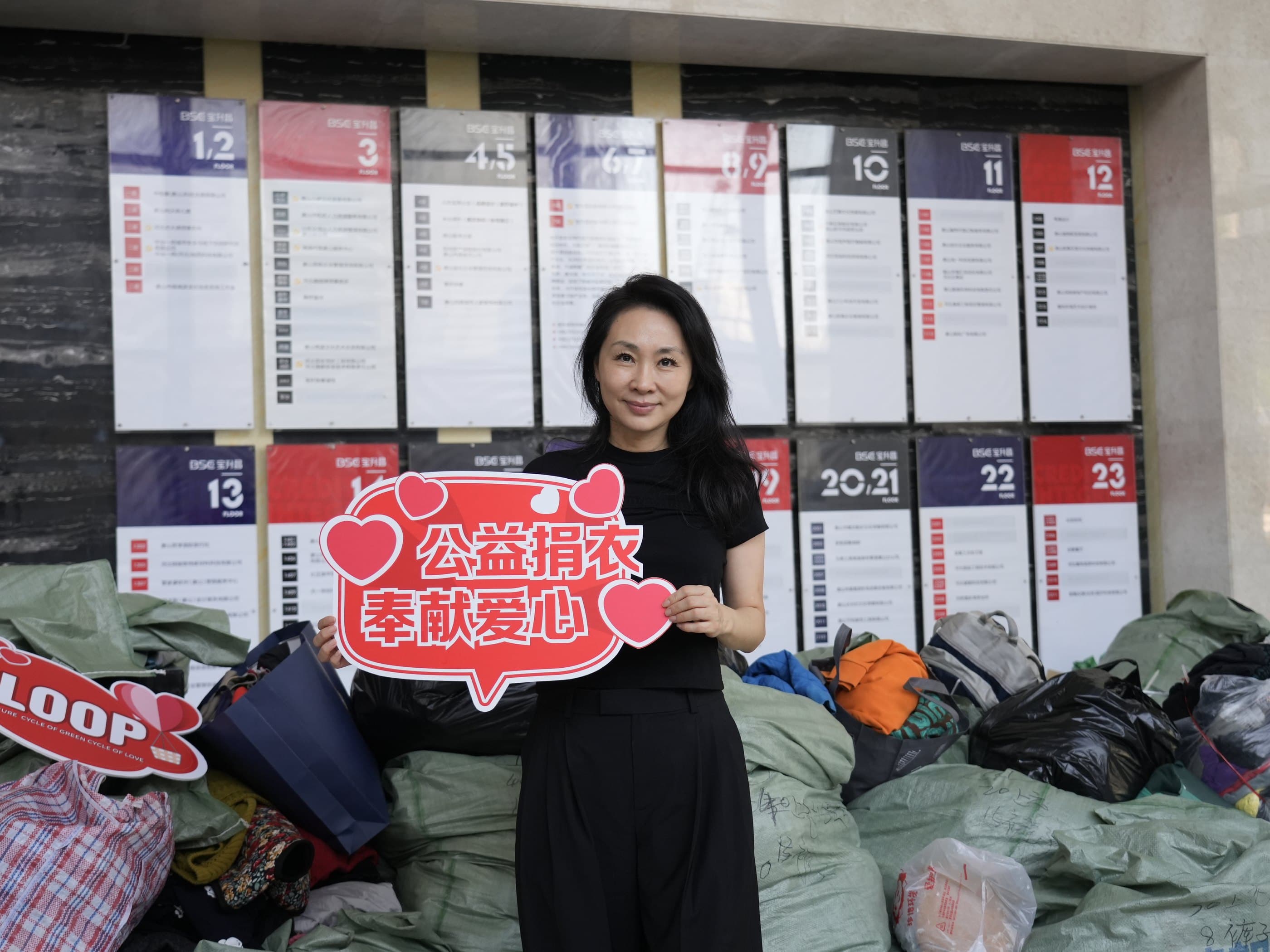 Packing donated clothing for Qinghai