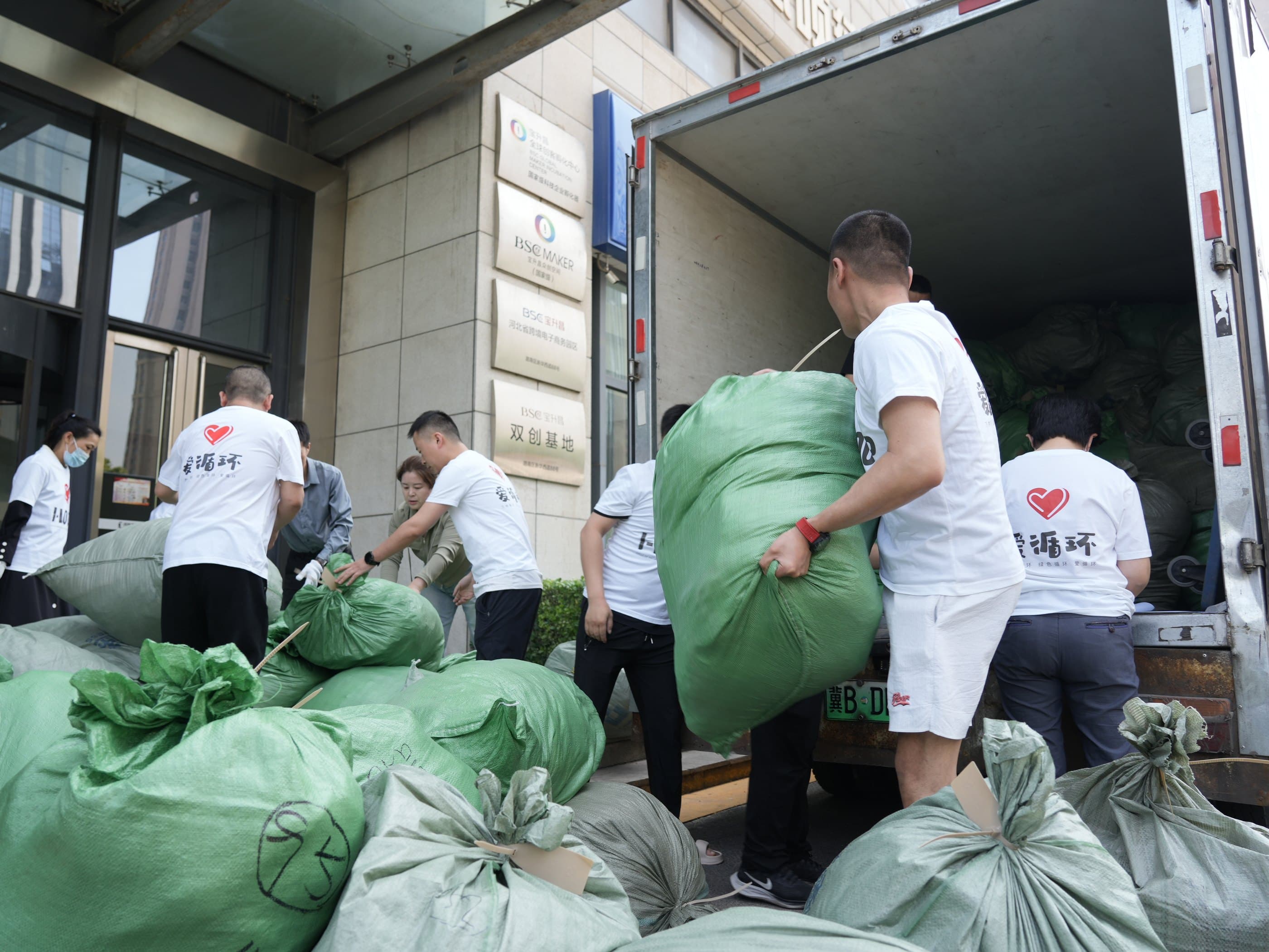 Packing donated clothing for Qinghai