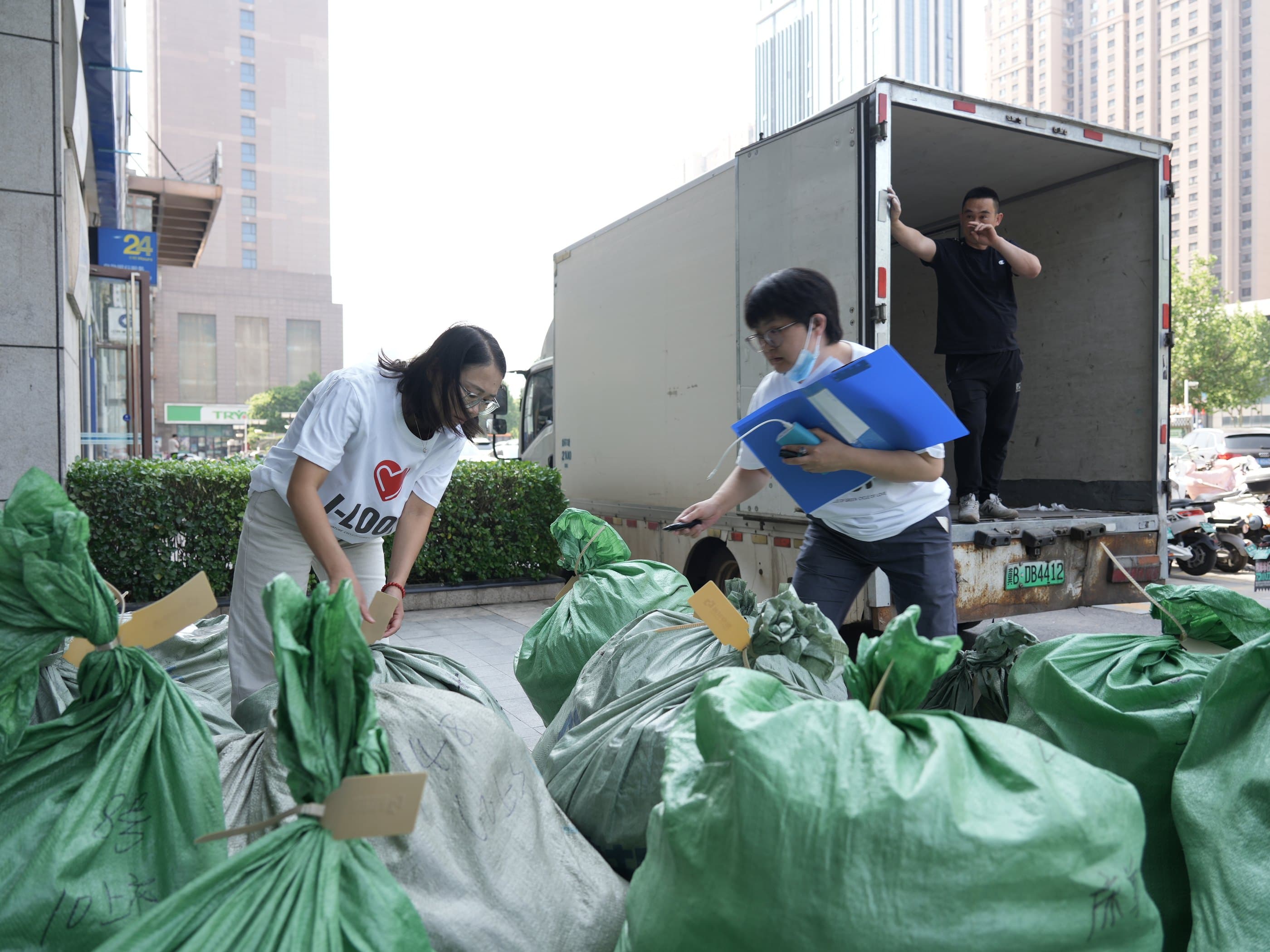Packing donated clothing for Qinghai