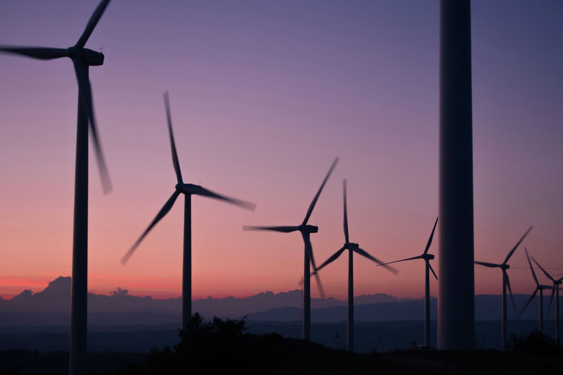 Wind turbines against the sunset
