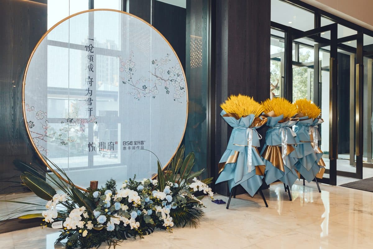 Circular moon-gate floral installation