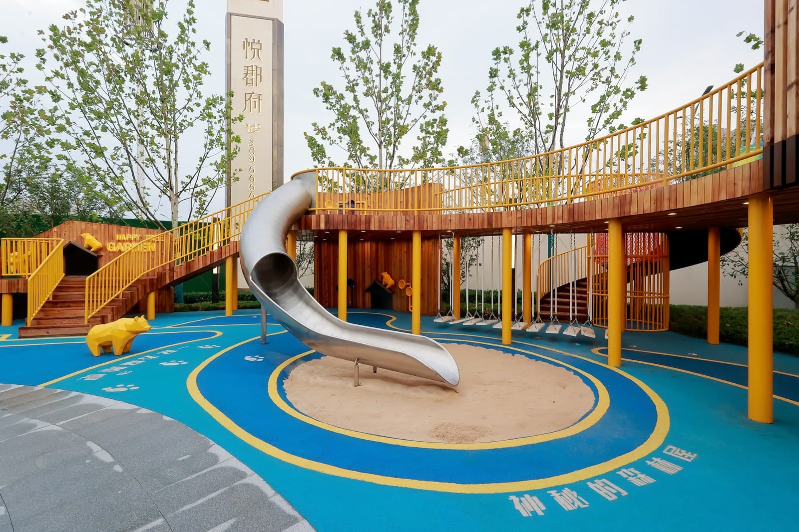 Playground with the tree house and slide