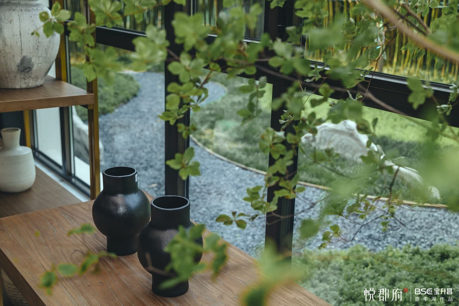Interior ceramics with a framed courtyard view